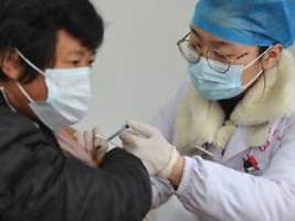 booster würde helfen: forscher: bis omikron wirkten chinas impfstoffe