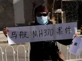 verschwundene passagiermaschine: hinterbliebene von flug mh370 verlangen erneute suche