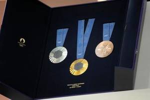 Olympia-Medaillen vorgestellt - mit Stück vom Eiffelturm
