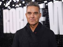 Die Familie singt: Ständchen macht Robbie Williams verlegen