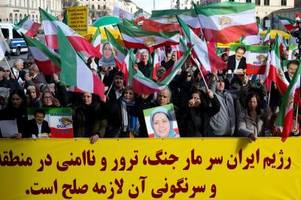 demo iranischer oppositioneller bei sicherheitskonferenz