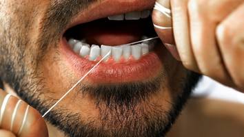 mundhygiene - warum zahnseide unerlässlich ist und wie man sie richtig anwendet