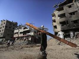 stadt liegt in schutt und asche: palästinenser kehren nach chan junis zurück