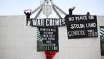 nahost-konflikt: pro-palästinensischer protest auf parlamentsdach in australien