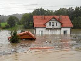 tausende menschen in gefahr: regenmassen lassen staudamm in polen bersten