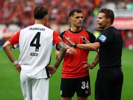 bundesliga: leverkusen bezwingt frankfurt in einem turbulenten spitzenspiel