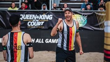 werbung für olympia-kampagne: beachvolleyball-party im regen