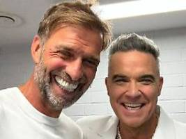 Ich liebe ihn ein bisschen: Jürgen Klopp strahlt mit Robbie Williams um die Wette