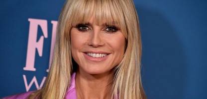 Heidi Klum schaut zu ihren Söhnen mit Seal auf