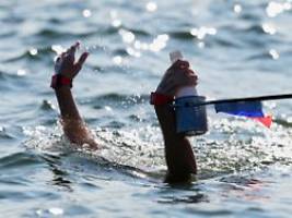 schon ziemlich benommen: freiwasser-athleten klagen über gefährliche bedingungen