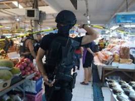 auf beliebtem markt: bewaffneter angreifer erschießt fünf menschen in bangkok