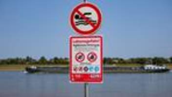 höchstens bis zum knöchel: dritte stadt greift durch: weiteres badeverbot im rhein