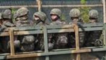 süd- und nordkorea: südkorea gibt warnschüsse in richtung nordkoreanischer soldaten ab
