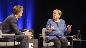 Merkel lobt Merz – und sieht einen Grund für den AfD-Aufstieg