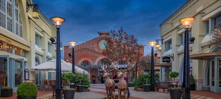 Shopping-Tourismus im Ingolstadt Village: Warum Touristen für dieses Outlet-Center um die halbe Welt fliegen