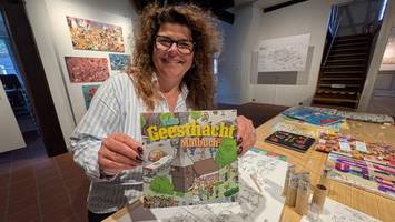 wimmelbilder: stadt an der elbe hat nun ein eigenes malbuch