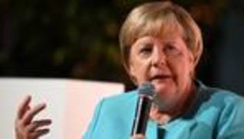 lesung in bonn: angela merkel mahnt maß und mitte an