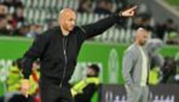 fußball-bundesliga: ich bin positiv: wolfsburg-trainer kämpft um seinen job