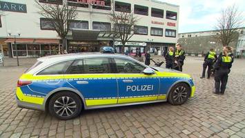 bedrohungslage – hubschrauber kreist über einkaufszentrum