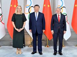 internationales olympisches komitee: mörder? macht hoch die tür! kriegstreiber? friede sei mit euch!