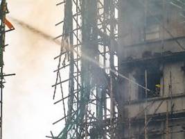 Flammen lodern noch immer: Zahl der Toten in Hongkong steigt auf 55 - noch viele Vermisste