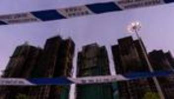 brand in hongkong: feuerwehr in hongkong geht von baldigem ende der löscharbeiten aus