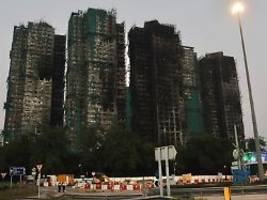 regierung beschmutzt: chinesische behörde in hongkong verwarnt kritische journalisten