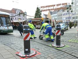 Sicherheit auf dem Weihnachtsmarkt: Augsburger Poller-Schieber werden zum Internet-Hit