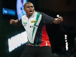 verrechnet, trotzdem gewonnen: tierarzt aus kenia schafft unfassbares darts-wunder