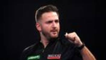 Turnier in London: Großer Darts-Coup: Merk wirft Ex-Weltmeister Wright raus