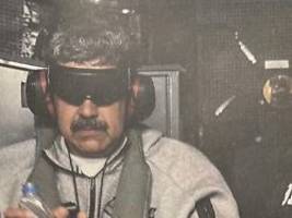 machthaber im jogginganzug: trump postet foto von gefesseltem maduro