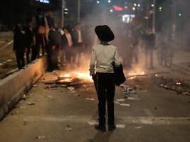 bus überfährt demonstranten: tausende ultraorthodoxe protestieren gegen wehrpflicht