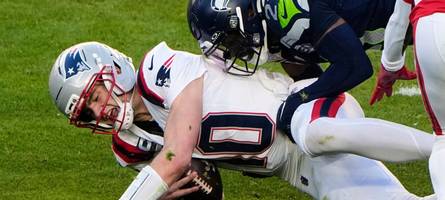 Bad Bunnys Zeichen der Liebe, Trumps Missmut und ein Quarterback am Boden