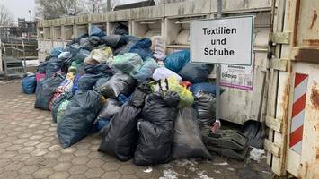 altkleidercontainer völlig überfüllt – weil ein gesetz zu früh kam?
