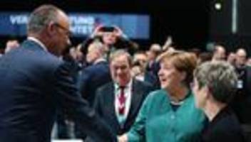 rückkehr nach sechs jahren: merkel bei cdu-parteitag mit langem applaus begrüßt