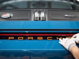 autoindustrie: porsche meldet gewinneinbruch um 93 prozent