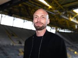 vorstellung des ex-fans ole book: keine zeit für sehnsucht: neuer bvb-sportdirektor mahnt zur geduld