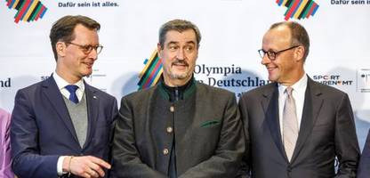 Markus Söder und Hendrik Wüst rangeln um Olympia