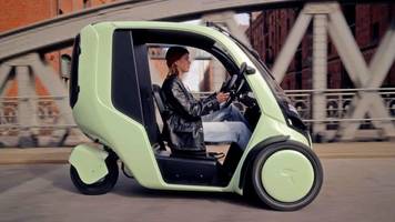 Überdachtes Fahrrad als Auto-Alternative in der Stadt