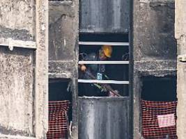 Erstmals nach Brandkatastrophe: Hongkong erlaubt kurze Rückkehr in verbrannte Hochhäuser