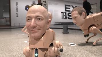 künstler baut hunde-roboter, die wie musk und bezos aussehen