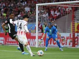 punkt aus freiburg entführt: vfl wolfsburg kämpft sich im relegationskampf auf die pole position