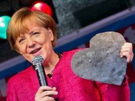 Kritik an Debatte: Merkel empfiehlt Merz ein weites Herz für die SPD