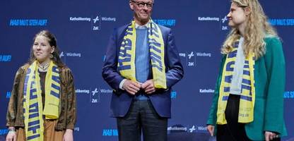 friedrich merz spricht auf katholikentag über usa unter trump und deutsche arbeitsmoral