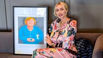 kunst aus china in berlin: merkel und kim jong-un ganz niedlich