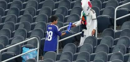Japanische Fußballfans bei der WM: 90 Minuten hat ein Spiel. Dann wird aufgeräumt