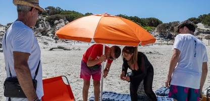 Sardinien / Italien: Der Sonnenschirm, die unbekannte Gefahr