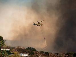 auch touristen evakuiert: feuer in südspanien wütet weiter - mindestens zwölf tote