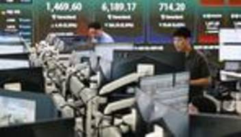börse in asien: börsen in asien brechen wegen verlusten bei chipproduktion ein